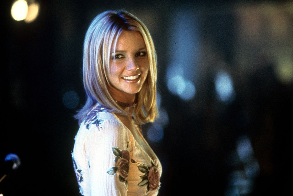 Image Credit: Getty Images / Britney Spears smiling as she looks back in a scene from the film 'Crossroads', 2002. Image Credit: Getty Images / Britney Spears smiling as she looks back in a scene from the film 'Crossroads', 2002.