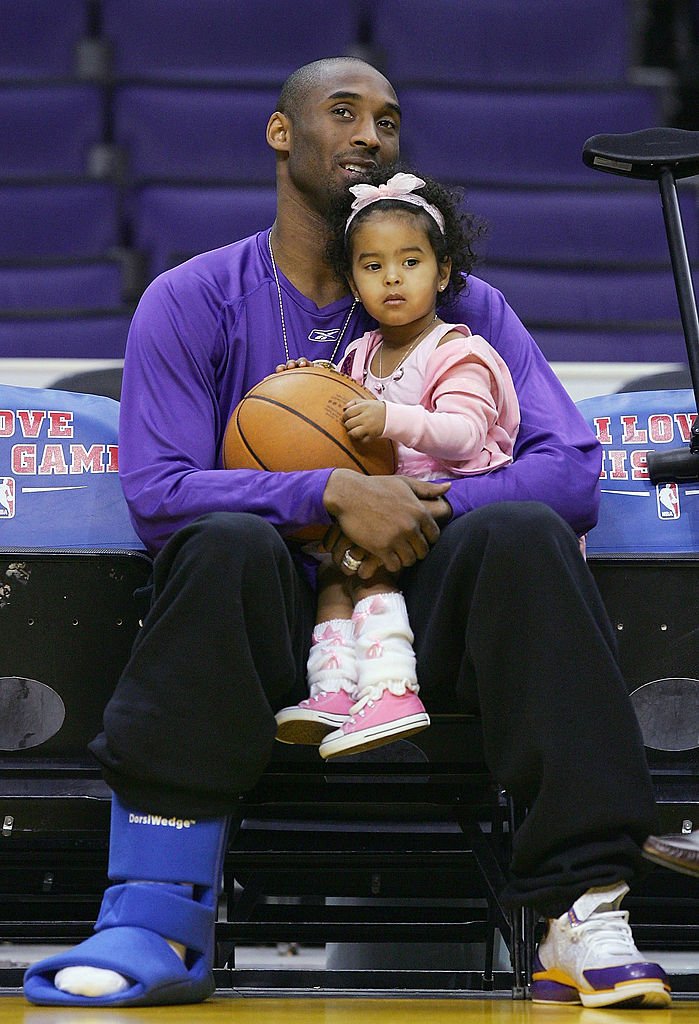 Image Source: Getty Images/Lisa Blumenfeld/Kobe Bryant #8 of the Los Angeles Lakers sits with his daughter, Natalia
