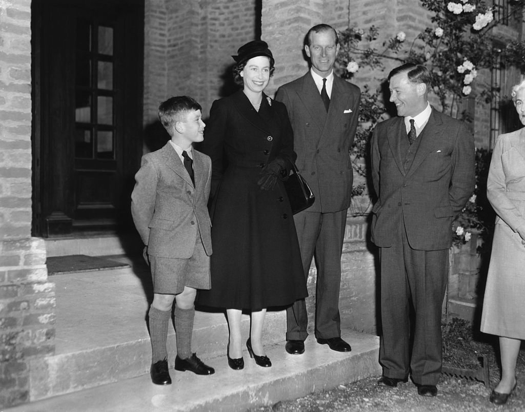 Image Credit: Getty Images / Prince Charles arrives at Cheam School in Berkshire to start his first term, and is introduced to the headmaster, Peter Beck, 23rd September 1957.