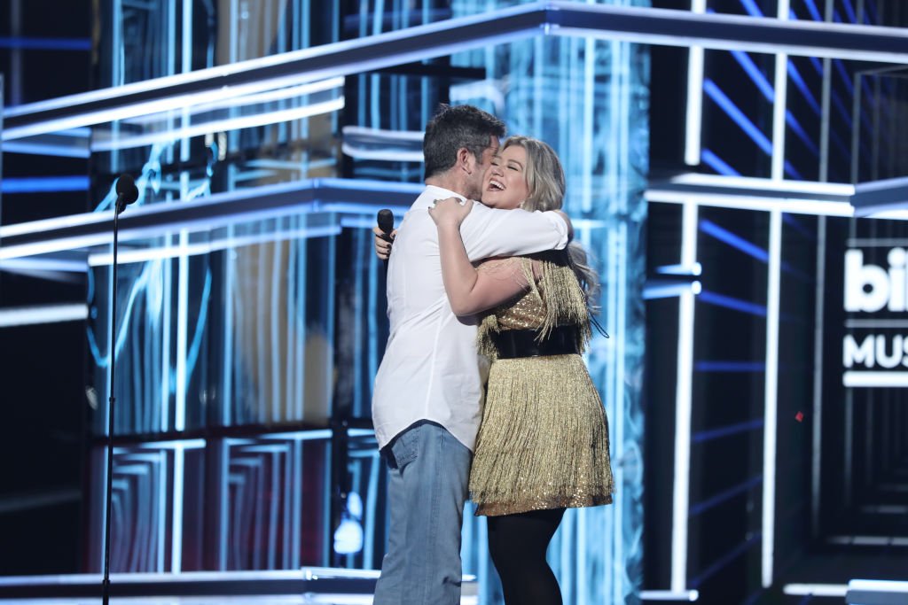 Image Credit: Getty Images / 2018 BBMA's at the MGM Grand, Las Vegas, Nevada -- Pictured: (l-r) Simon Cowell, Kelly Clarkson.