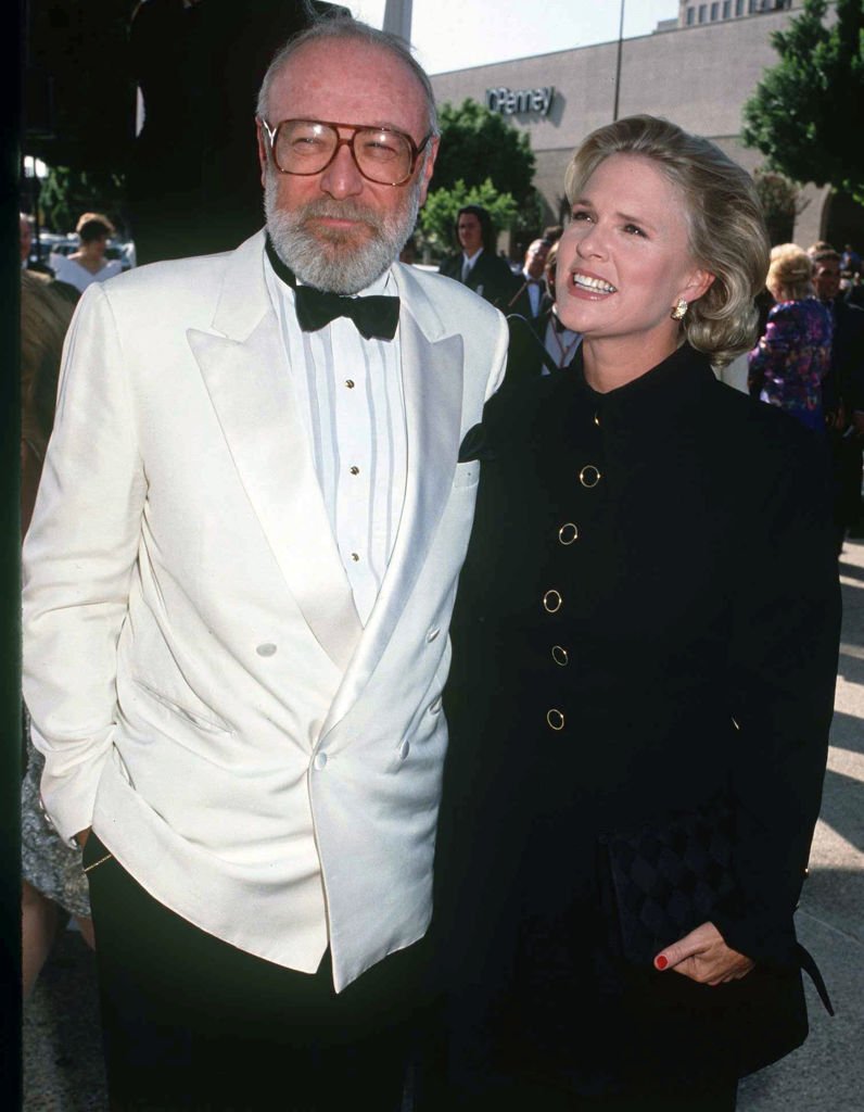 Image Credits: Getty Images / Kypros | Barney Rosenzweig with wife Sharon Gless