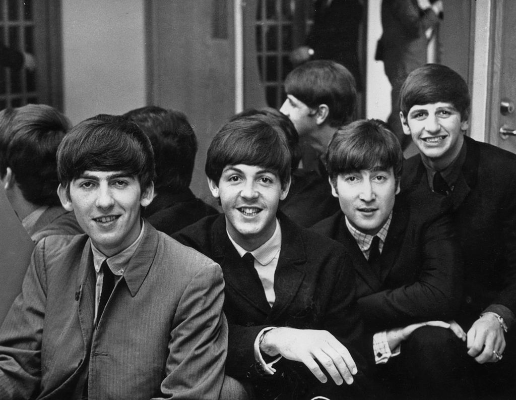 Image Credits: Getty Images / Keystone | British pop group The Beatles, from left to right: George Harrison (1943 - 2001), Paul McCartney, John Lennon (1940 - 1980) and Ringo Starr, in Sweden.
