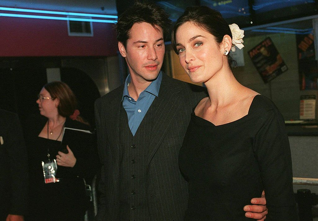Image Credits: Getty Images / Patrick Riviere | Keanu Reeves and Carrie Anne Moss attend the Australian Premiere of The Matrix in Sydney, Australia.
