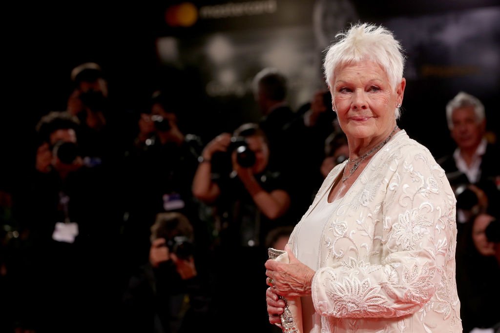 Image Credit: Getty Images / Judi Dench walks the red carpet ahead of the 'Victoria & Abdul’ screening on September 3, 2017 in Venice, Italy.