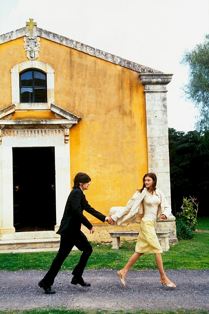 Image Credits: Getty Images / Vogue 1999 - Model, Trish Goff, and her husband Aaron Ward,