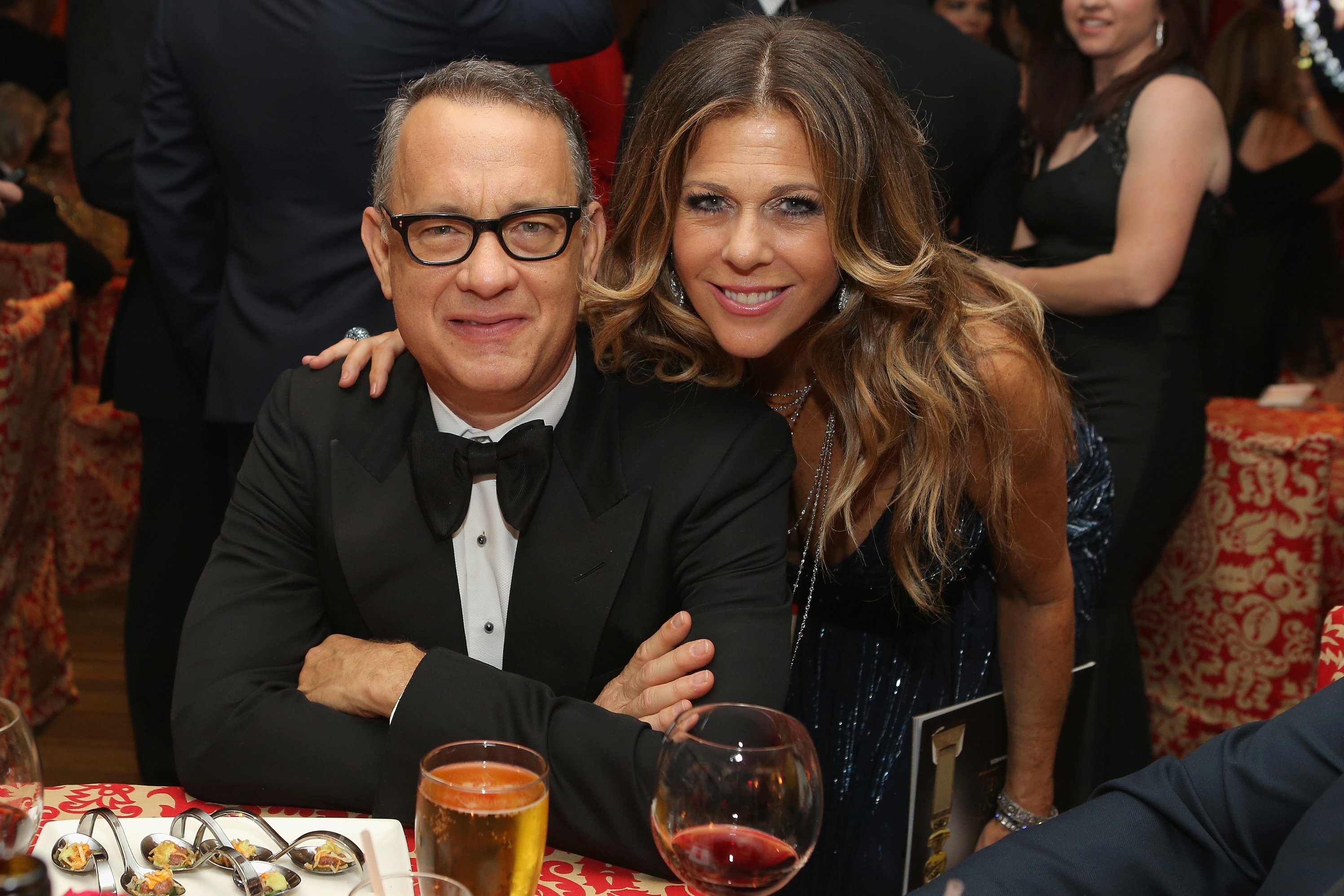 Image Credits: Getty Images / Mike Windle | Actors Tom Hanks (L) and Rita Wilson attend HBO's Post 2014 Golden Globe Awards Party at Circa 55 Restaurant on January 12, 2014 in Los Angeles, California.