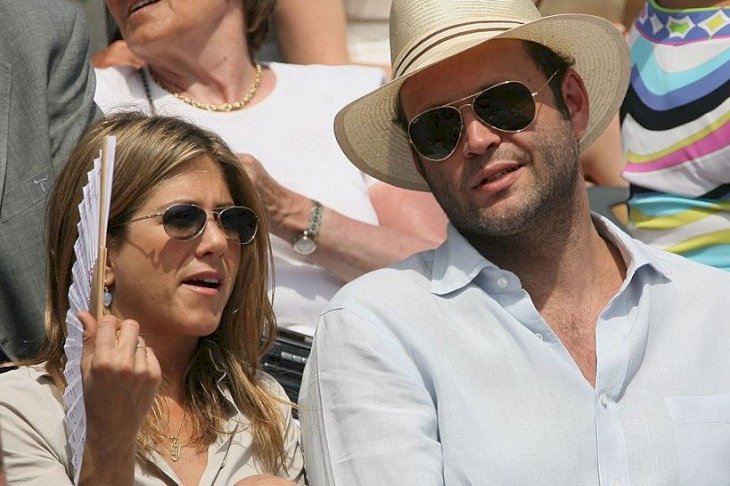 Image Credit: Getty Images/Clive Brunskill | Jennifer Aniston and Actor Vince Vaughn attend the French Open