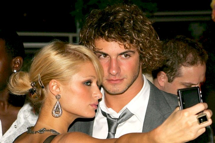 Image Credits: Getty Images / John Shearer / WireImage | Paris Hilton and Stavros Niarchos.