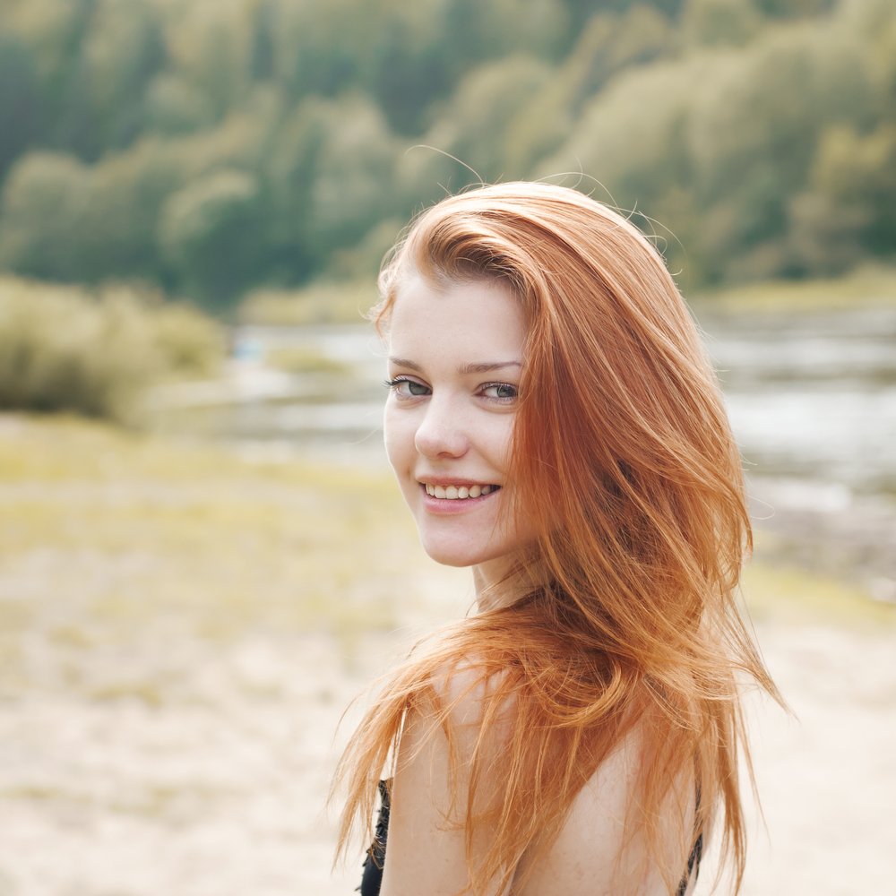 Red haired girl | Shutterstock
