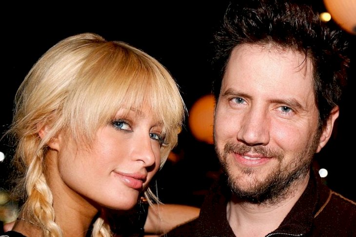 Image Credits: Getty Images / Andrew D. Bernstein | Socialite Paris Hilton poses with actor Jamie Kennedy.