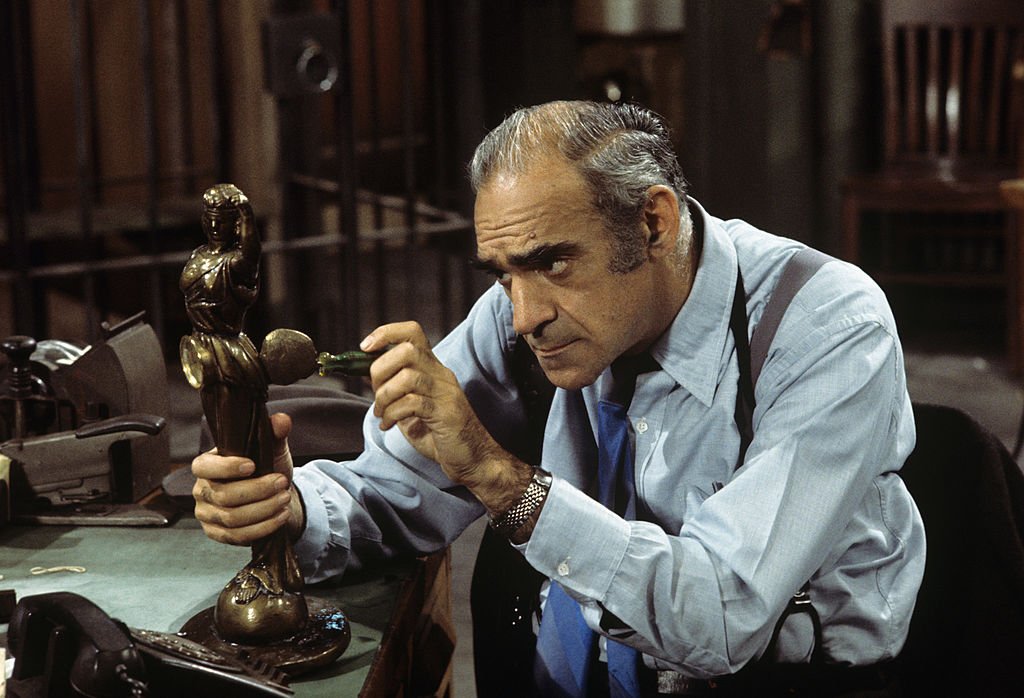 Image Credit: Getty Images / Abe Vigoda on set for Barney Miller. Image Credit: Getty Images / Abe Vigoda on set for Barney Miller.