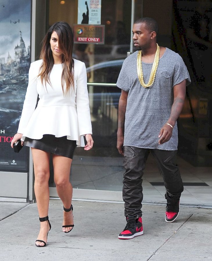 Image Credit: Getty Images / Kanye West and Kim Kardashian are photographed leaving a function.