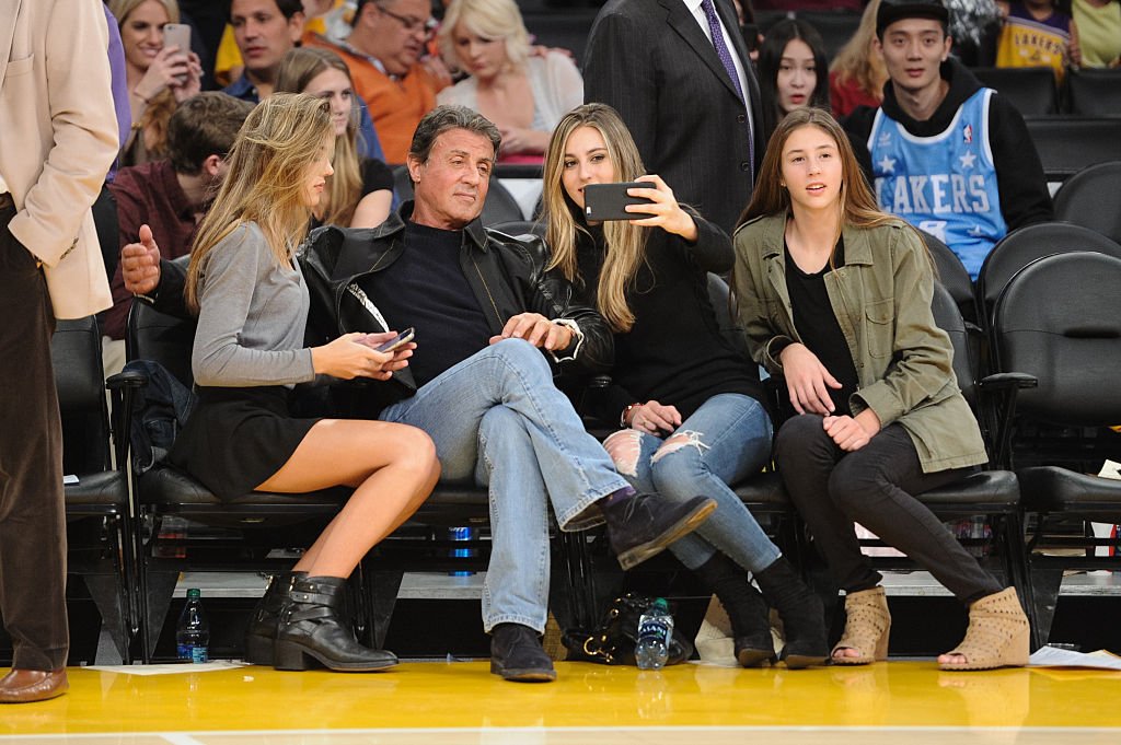 Image Source: Getty Images/GC Images/Noel Vasquez | Stallone and his daughters at a Lakers vs. Rockets game