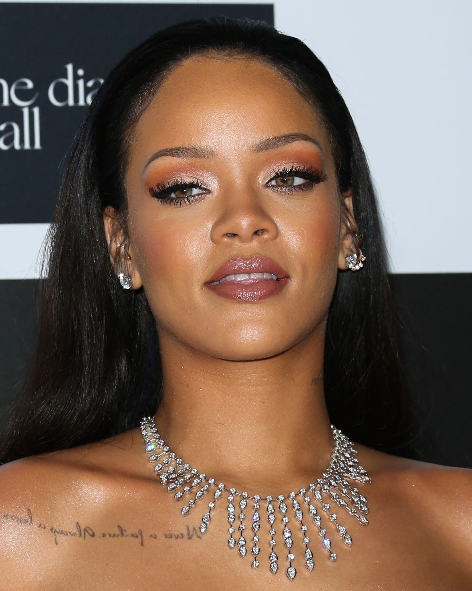 Image Credit: Getty Images / Singer and business mogul, Rihanna poses for a picture on the red carpet.
