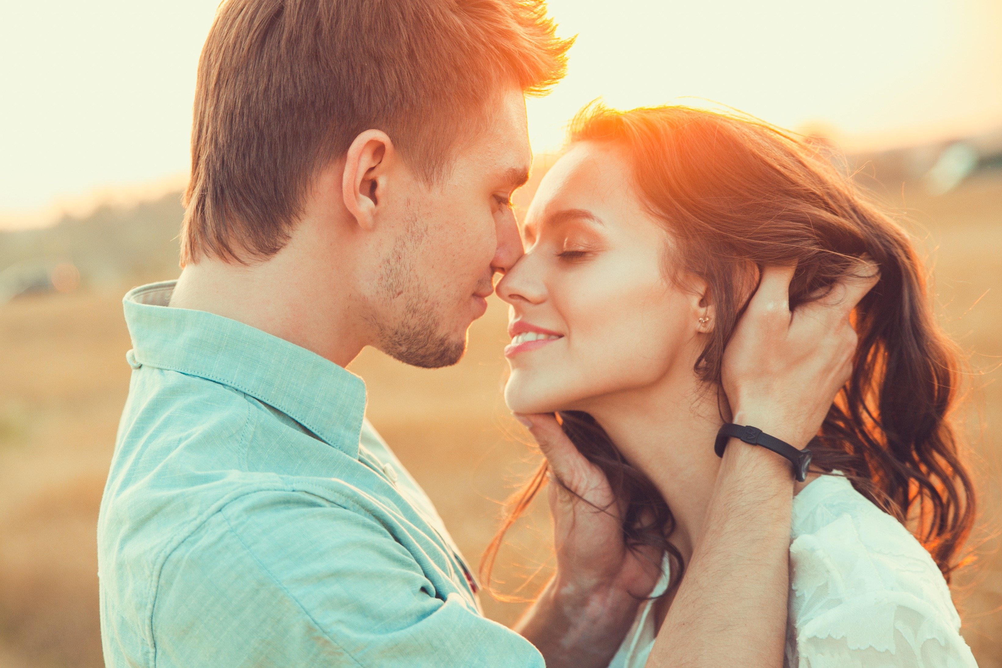 Image Credits: Shutterstock / Couple sunset