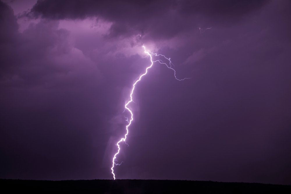 Lightning bolt hitting the ground | Shutterstock