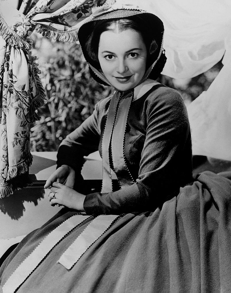Image Credits: Getty Images / Donaldson Collection/Michael Ochs Archives | Olivia de Havilland poses for a publicity Still for "Gone With the Wind" in 1939 Image Credits: Getty Images / Donaldson Collection/Michael Ochs Archives | Olivia de Havilland poses for a publicity Still for "Gone With the Wind" in 1939