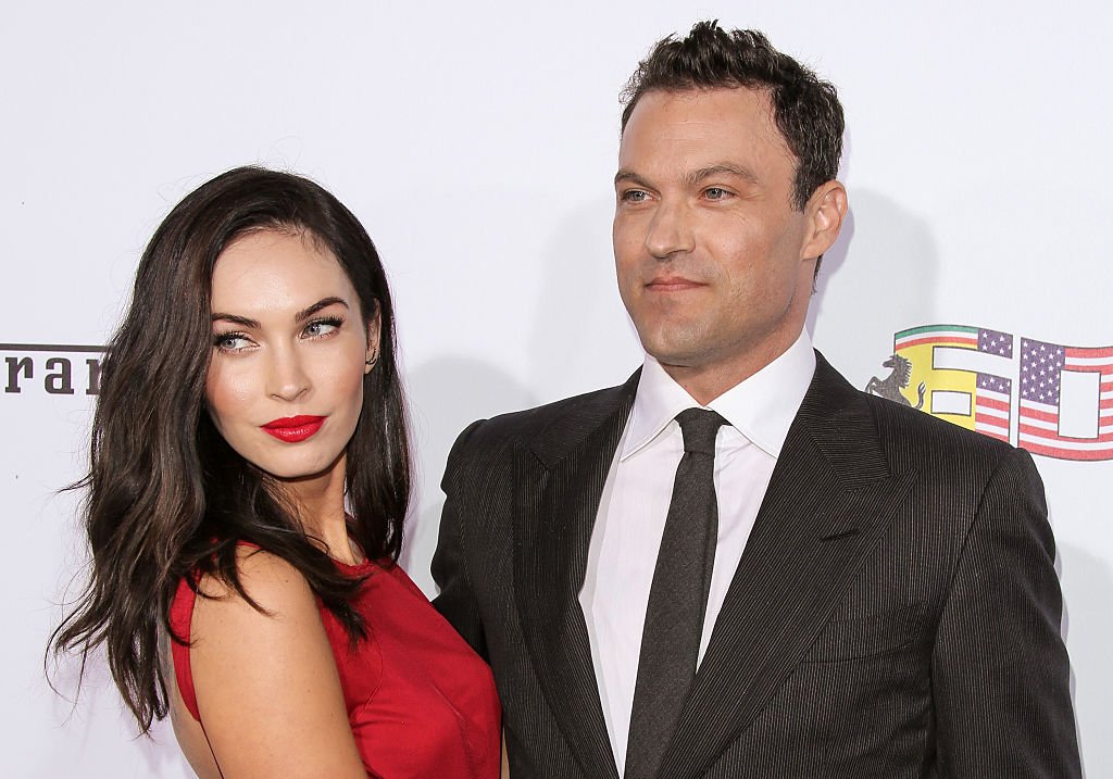 Image Credits: Getty Images / Paul Archuleta / FilmMagic | Actors Megan Fox (L) and Brian Austin Green (R) attend Ferrari's 60th Anniversary In The USA Gala at the Wallis Annenberg Center for the Performing Arts on October 11, 2014 in Beverly Hills, California.
