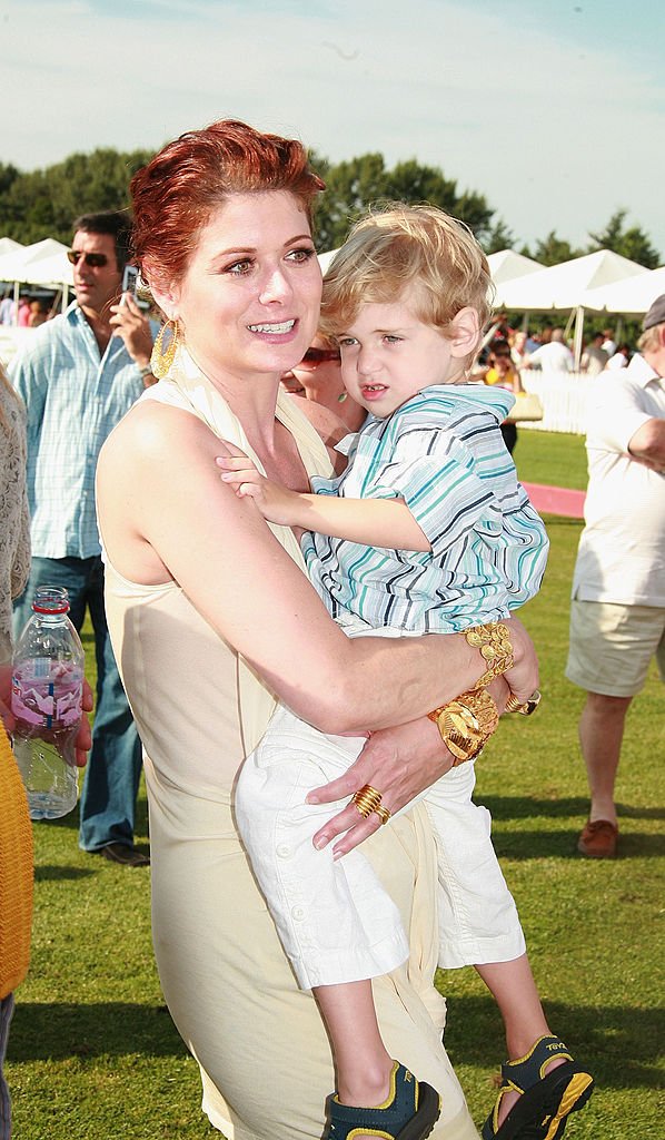Image Source: Getty Images/Tana Lee Alves| Actress Debra Messing and son Roman visit the Mercedes Benz Polo Challenge July 21, 2007 at the Bridgehampton Polo Club in Water Mill, New York