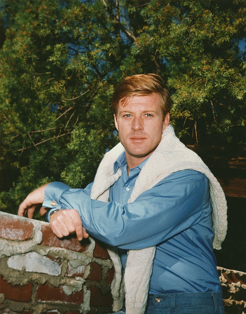 Image Credits: Getty Images / Herbert Dorfman / Corbis | Robert Redford Leaning on a Brick Wall.