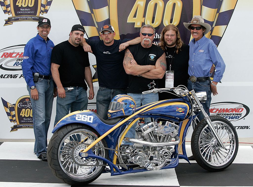 Image Credits: Getty Images / Dilip Vishwanat | (L-R) Kyle Petty of Petty Enterprises, Vince DiMartino, Paul Teutul Jr. Paul Teutul Sr. Mikey Teutul (of Orange County Choppers) and Richard Petty of Petty Enterprises, unveil the OCC Custom Sunoco Motorcycle prior to the NASCAR Nextel Cup Series Crown Royal 400 May 6, 2006 in Richmond, Virgina.