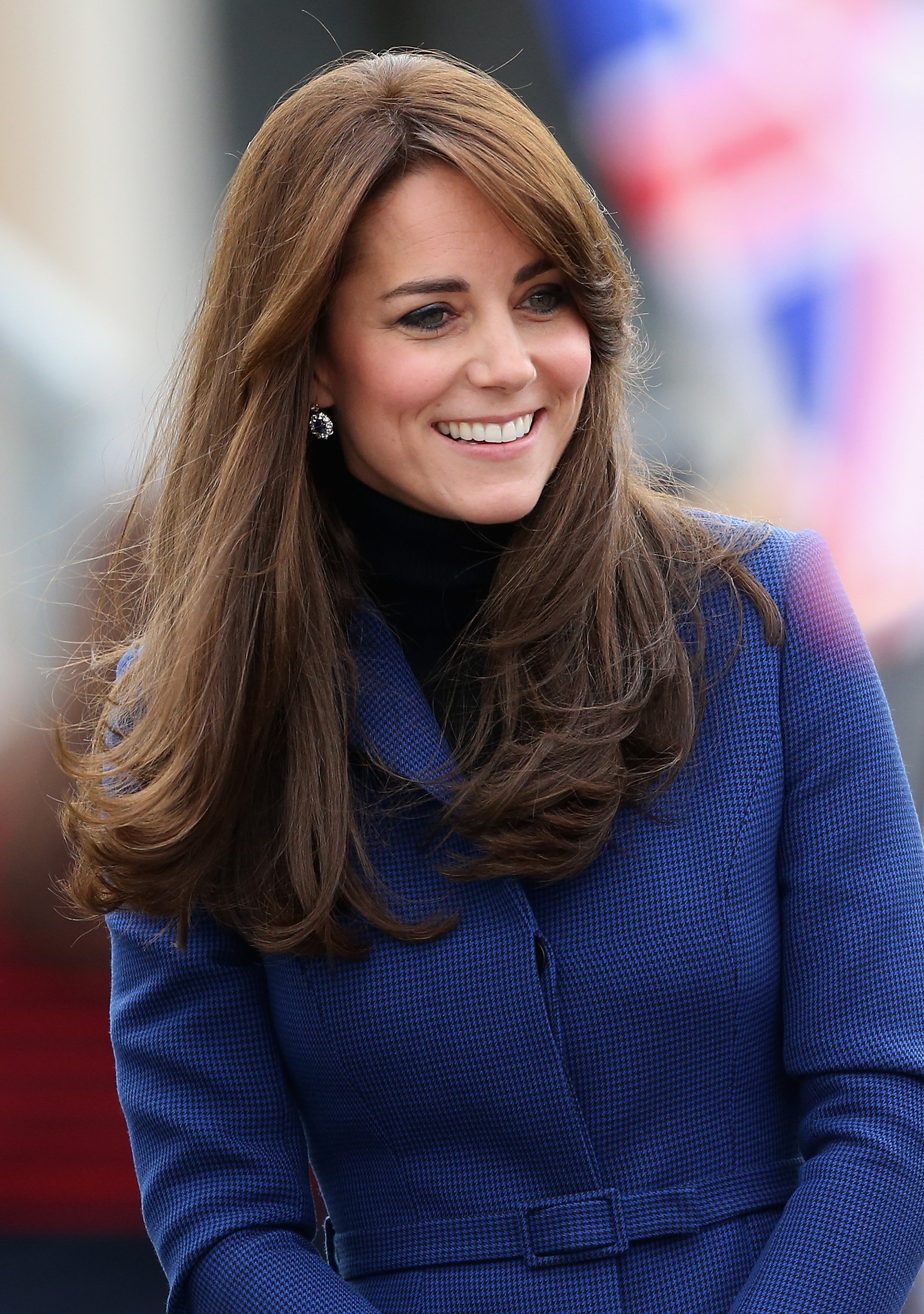 Image Source: Getty Images/Kate wearing a blue coat