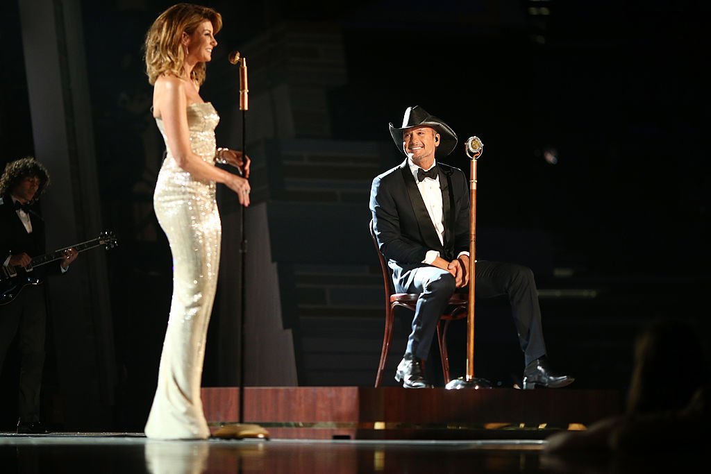 Image Credits: Getty Images / Christopher Polk / ACMA2014 | Recording artists Faith Hill (L) and Tim McGraw perform onstage during the 49th Annual Academy of Country Music Awards at the MGM Grand Garden Arena on April 6, 2014 in Las Vegas, Nevada. Image Credits: Getty Images / Christopher Polk / ACMA2014 | Recording artists Faith Hill (L) and Tim McGraw perform onstage during the 49th Annual Academy of Country Music Awards at the MGM Grand Garden Arena on April 6, 2014 in Las Vegas, Nevada.