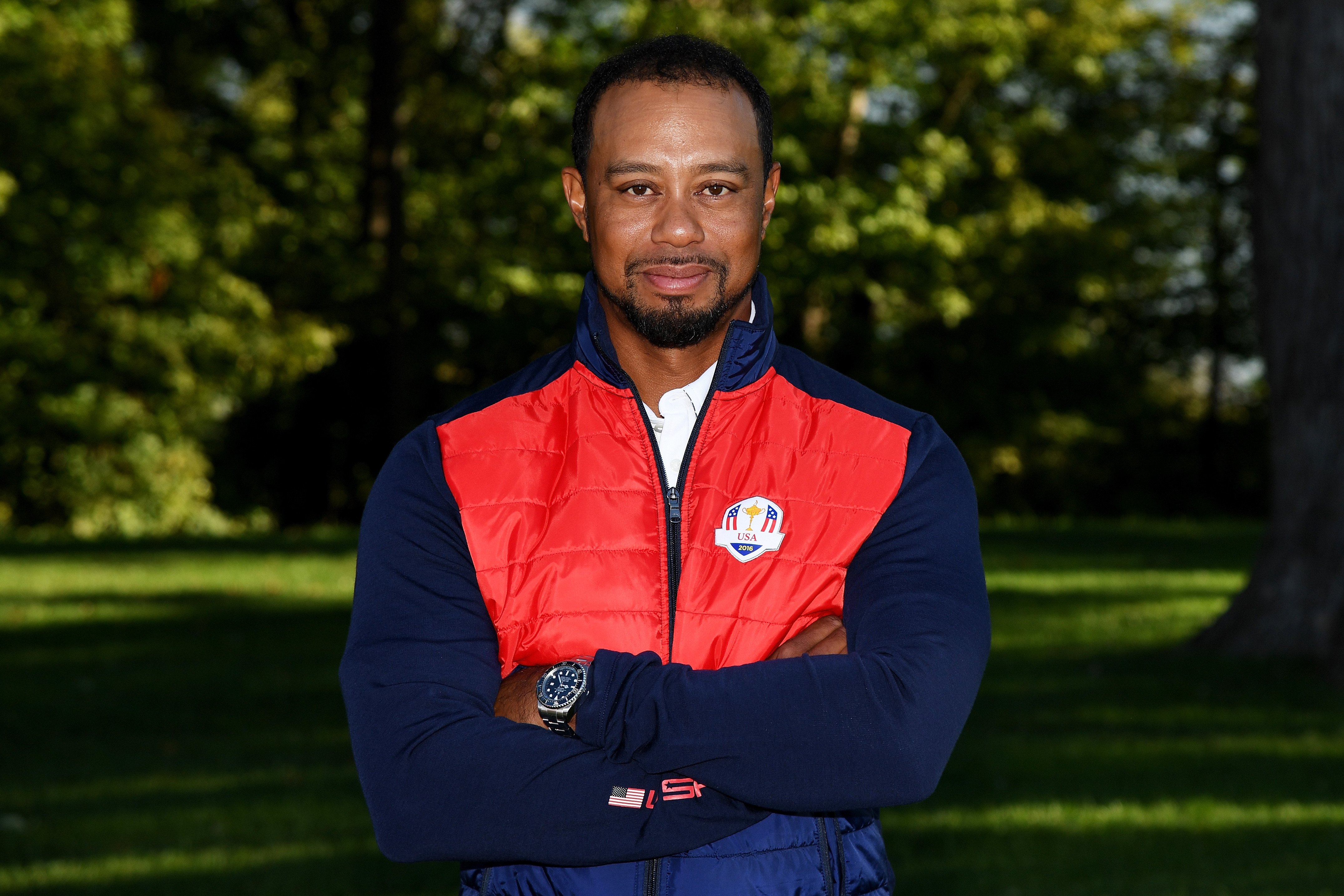 Image Credits: Getty Images / Ross Kinnaird | Vice-captain Tiger Woods of the United States poses during team photocalls prior to the 2016 Ryder Cup at Hazeltine National Golf Club on September 27, 2016 in Chaska, Minnesota. Image Credits: Getty Images / Ross Kinnaird | Vice-captain Tiger Woods of the United States poses during team photocalls prior to the 2016 Ryder Cup at Hazeltine National Golf Club on September 27, 2016 in Chaska, Minnesota.