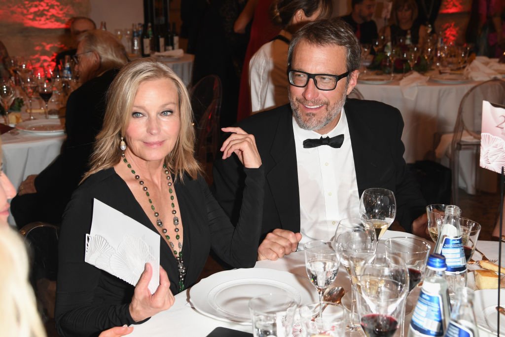 Image Credit: Getty Images / The model and Hollywood actor Bo Derek and John Corbett are photographed by the press.