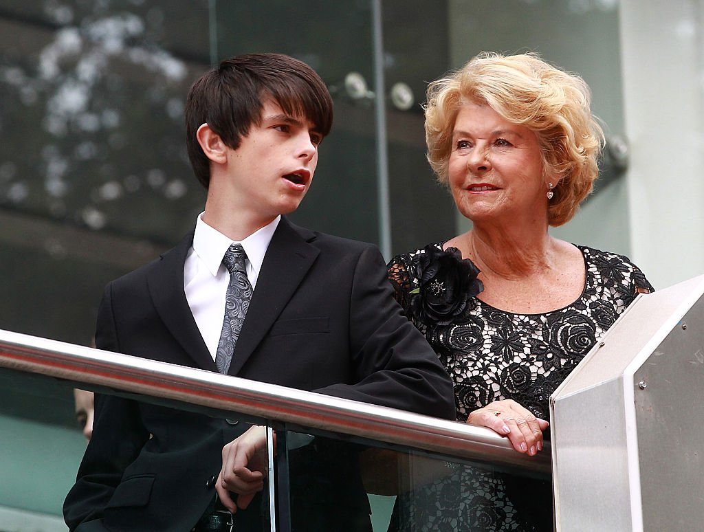 Image Credits: Getty Images / Fred Duval / FilmMagic | Dylan Douglas and His grandmother Patricia attend the European Premiere of Marvel's "Ant-Man' at Odeon Leicester Square on July 8, 2015 in London, England.