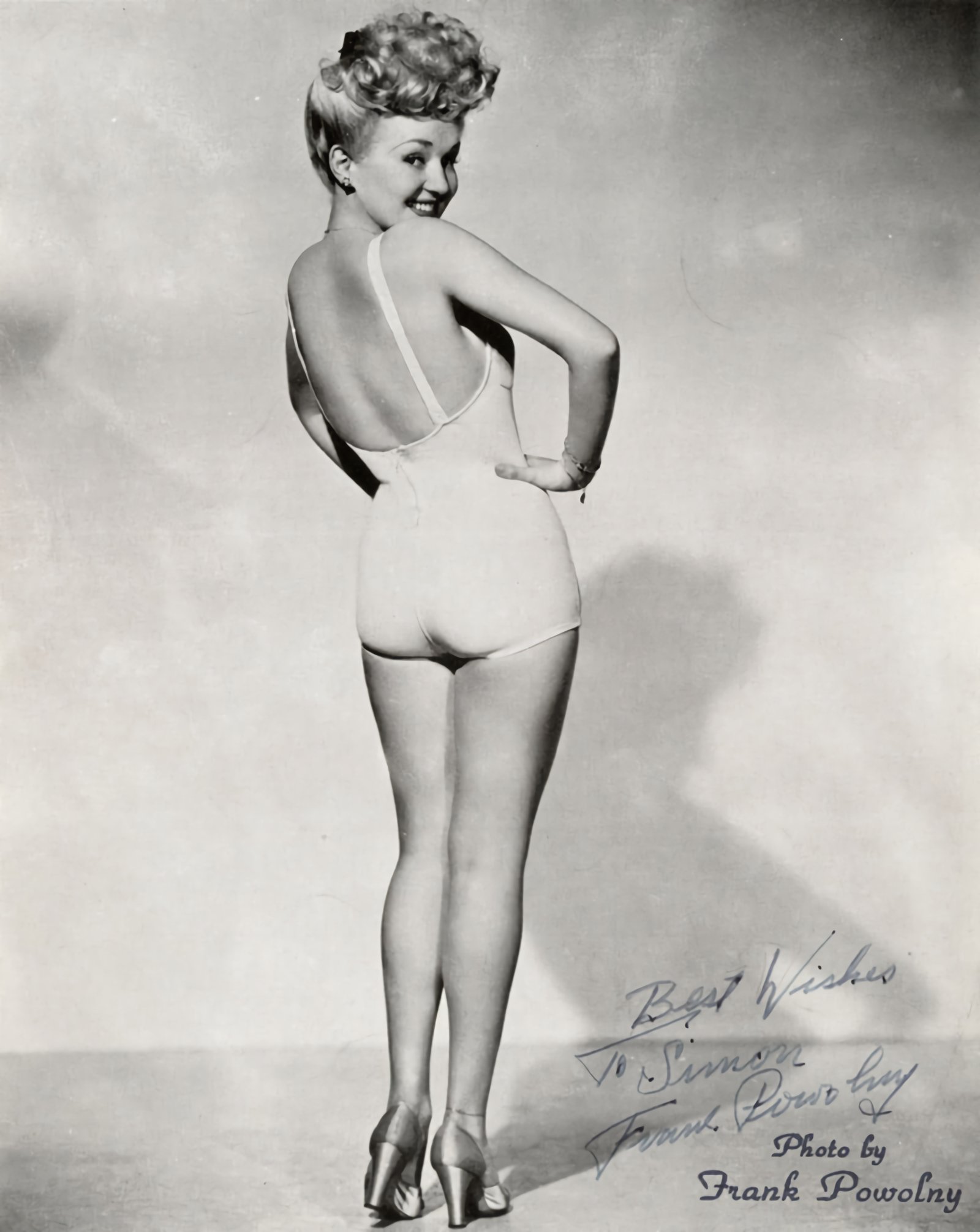 Image Source: Wikimedia Commons|Grable's iconic over-the-shoulder pose from 1943 (due to the fact she was visibly pregnant) was a World War II bestseller, showing off her "Million Dollar Legs".