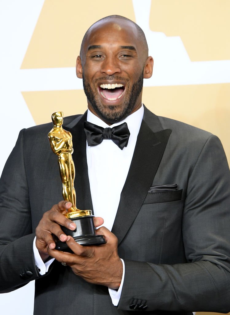 Image Credits: Getty Images / Steve Granitz/WireImage | Filmmaker Kobe Bryant, winner of the Animated Short award for "Dear Basketball"