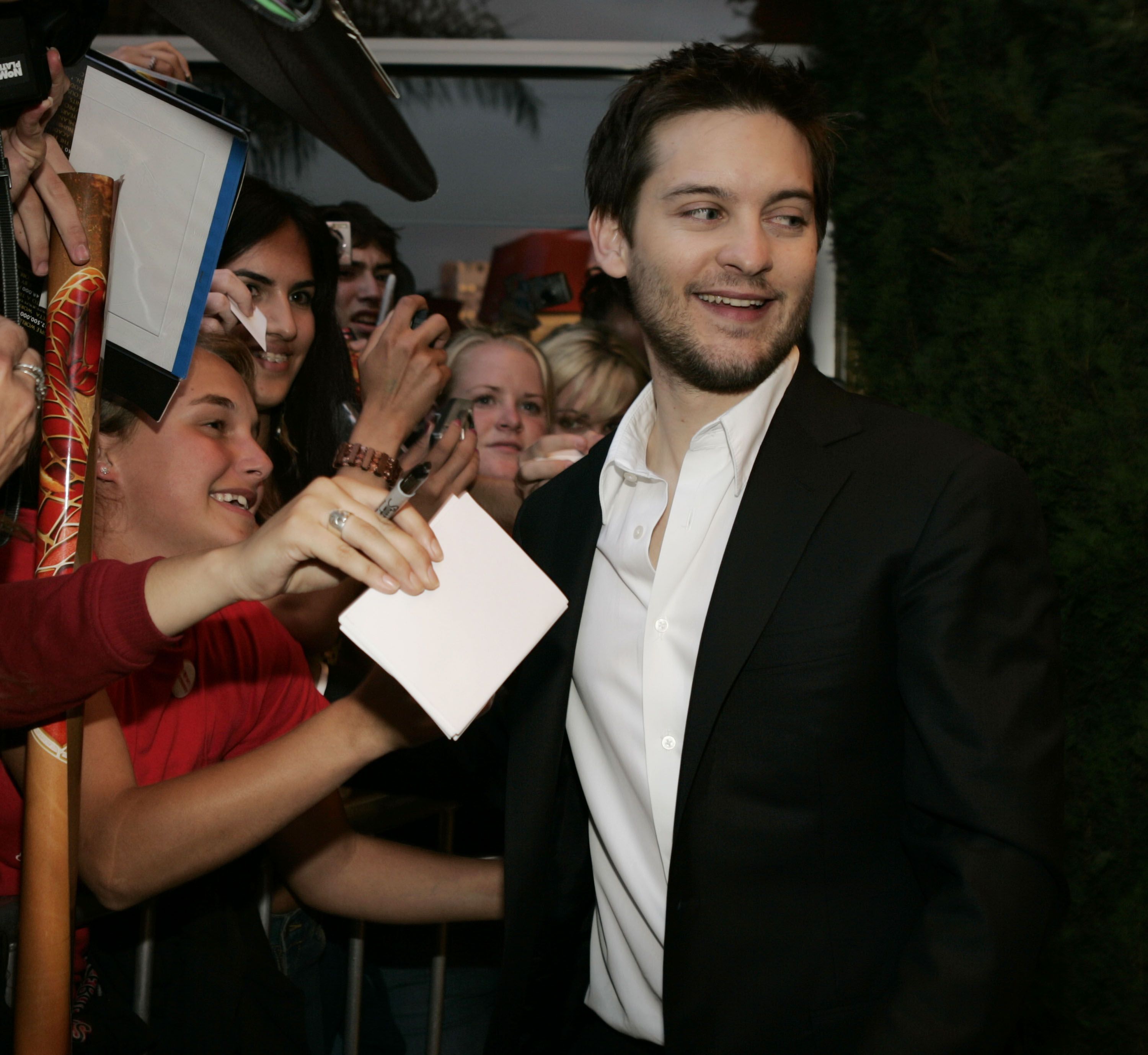 Tobey Maguire Giving Out Autographs / Getty Images