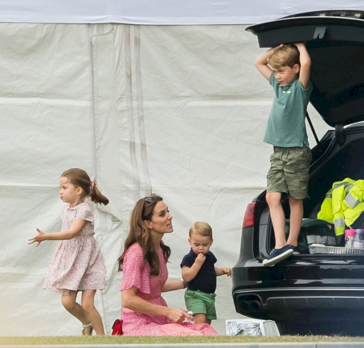 Image Credit: Getty Images / Catherine, Duchess of Cambridge, Prince Louis, Prince George and Princess Charlotte attend The King Power Royal Charity Polo Day at Billingbear Polo Club.