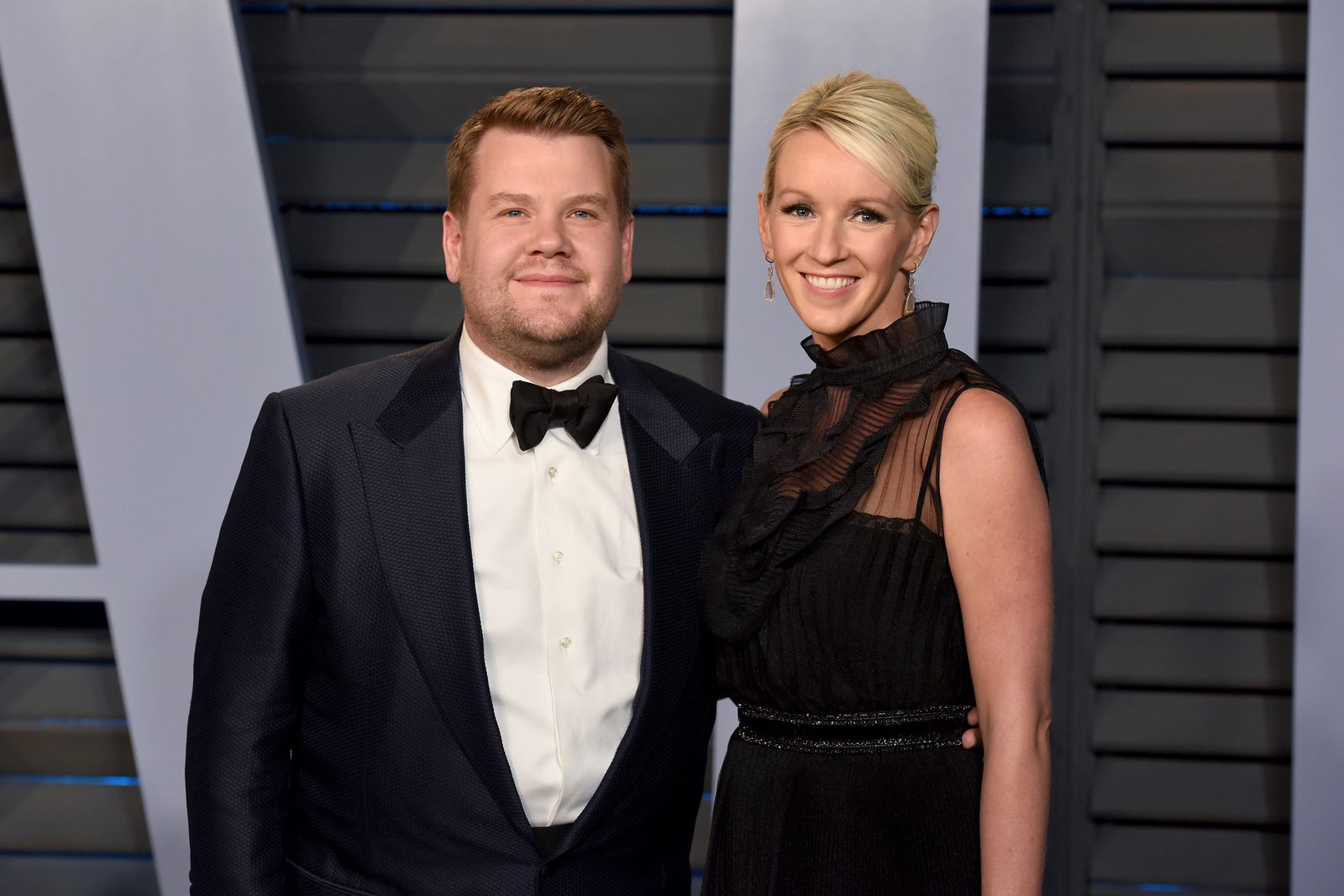 James Corden and Julia Carey attend the 2018 Vanity Fair Oscar Party Hosted By Radhika Jones - Arrivals at Wallis Annenberg Center for the Performing Arts in 2018, Beverly Hills/Photo:Getty Images)