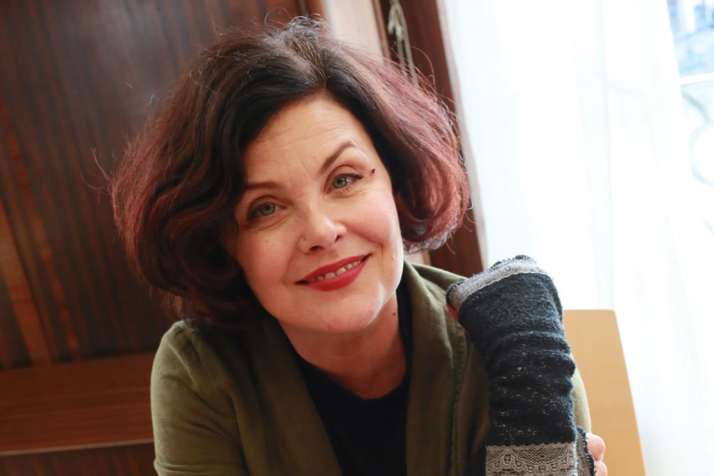 Image Credits: Getty Images / Amy T. Zielinski | Actress Sherilyn Fenn, who plays the character Audrey Horne in the TV series Twin Peaks poses for a photograph during the Twin Peaks UK Festival 2017 at Hornsey Town Hall Arts Centre on October 8, 2017 in London, England.