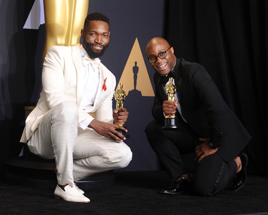 Image Credits: Getty Images / Jason LaVeris/FilmMagic | Screenwriter Tarell Alvin McCraney and writer/director Barry Jenkins, winners of Best Adapted Screenplay for 'Moonlight'