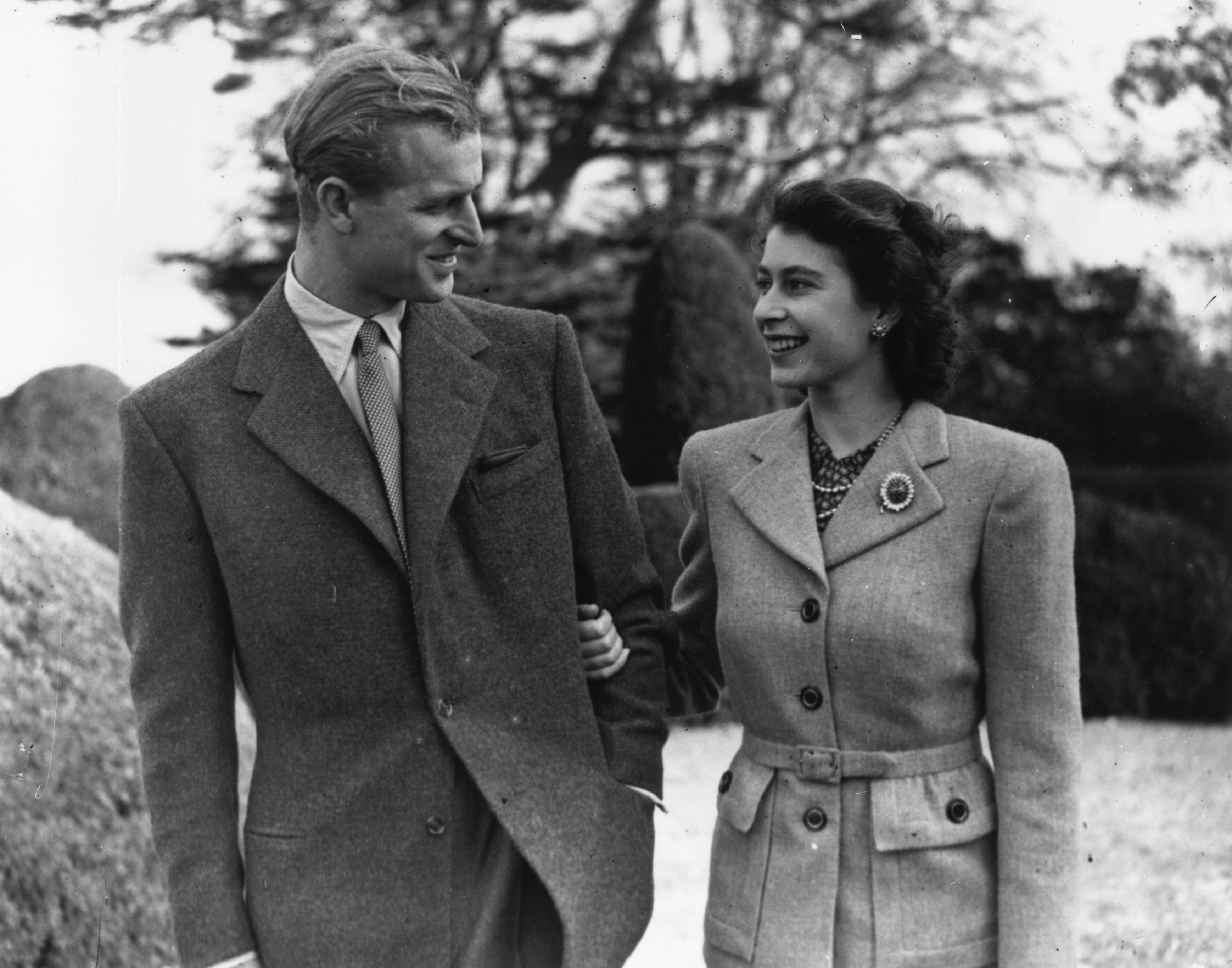 Image Source: Getty Images/Topical Press Agency/Princess Elizabeth and The Prince Philip, Duke of Edinburgh enjoying a walk during their honeymoon at Broadlands, Romsey, Hampshire