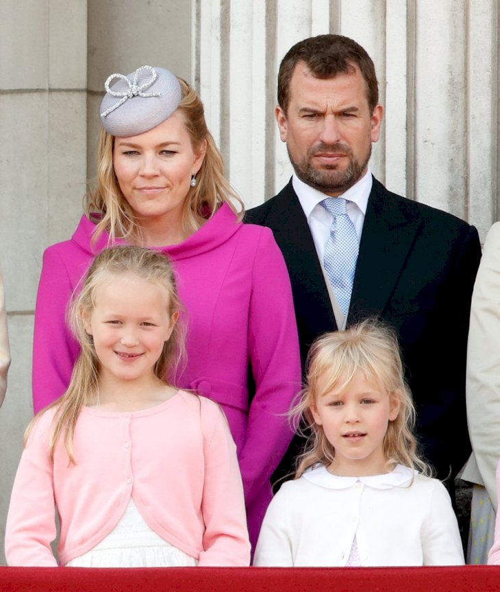 Image Credit: Getty Images / Peter Phillips with his wife, Autumn, and their daughters, Savannah and Isla.