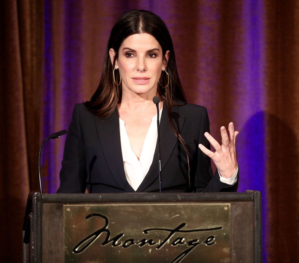 Image Credits: Getty Images / Frederick M. Brown | Actress Sandra Bullock speaks during the Beverly Hills Bar Association's 2018 Entertainment Lawyer of the Year Dinner at the Montage Beverly Hills on May 3, 2018 in Beverly Hills, California.