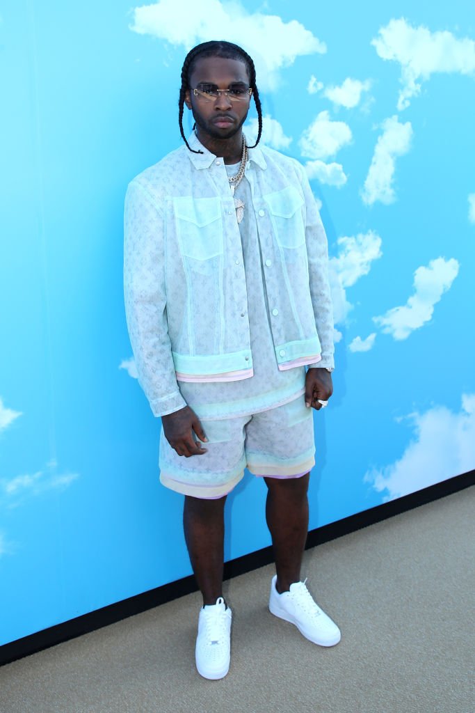 Image Source: Getty Images/Bertrand Rindoff Petroff/Rapper Pop Smoke attends the Louis Vuitton Menswear Fall/Winter 2020-2021 show as part of Paris Fashion Week on January 16, 2020 in Paris, France.