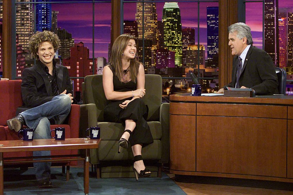 Image Credit: Getty Images / American Idol contestants Justin Guarini and Kelly Clarkson during an interview with host Jay Leno on June 9, 2003. Image Credit: Getty Images / American Idol contestants Justin Guarini and Kelly Clarkson during an interview with host Jay Leno on June 9, 2003.