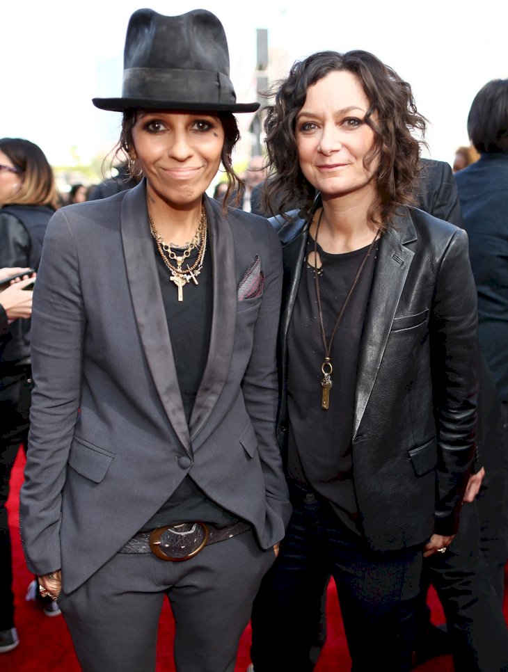 Image Credit: Getty Images/Getty Images for MTV/Christopher Polk | Linda Perry and actress Sara Gilbert attend the 2014 MTV Movie Awards
