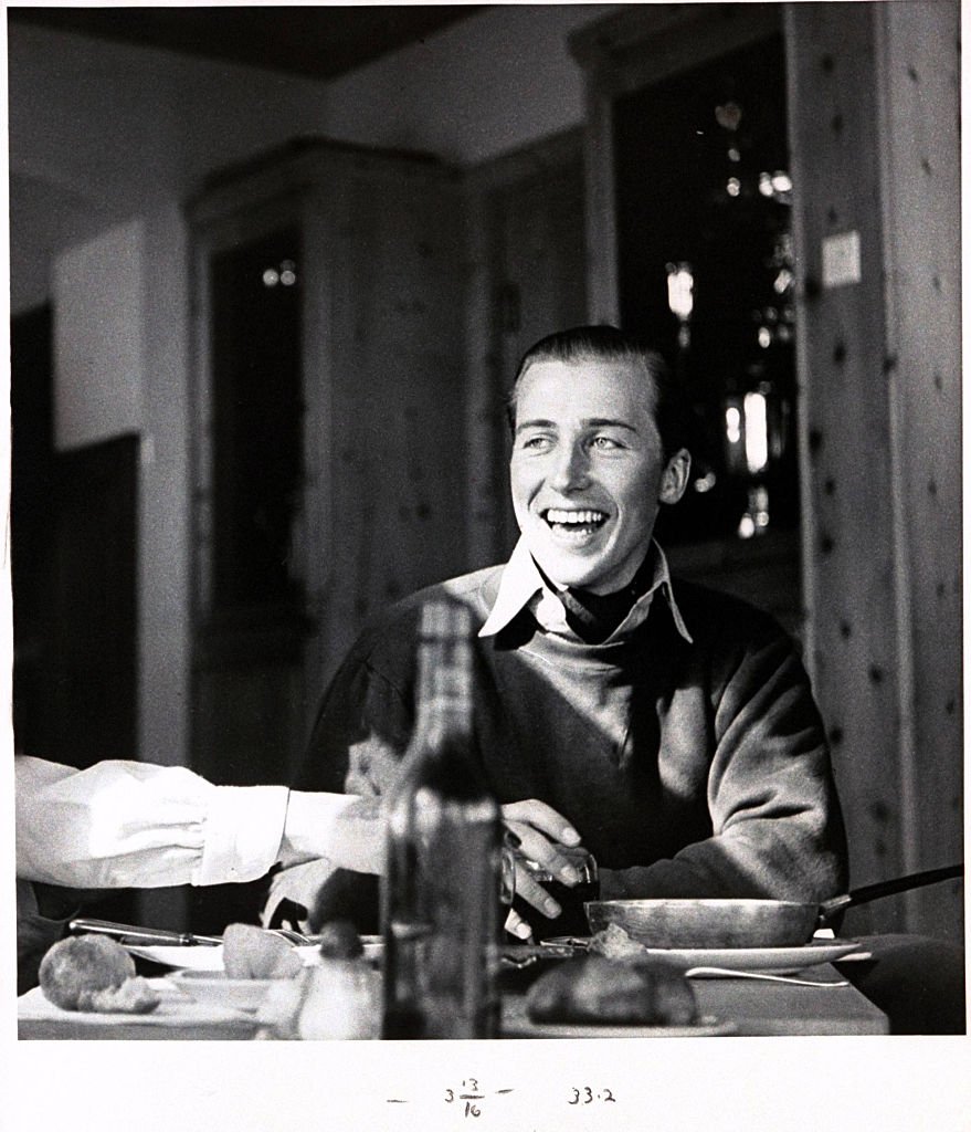 Image Credits: Getty Images / Henry Clarke / Condé Nast | Lord Porchester at the Corviglia Club, St. Moritz, Switzerland.