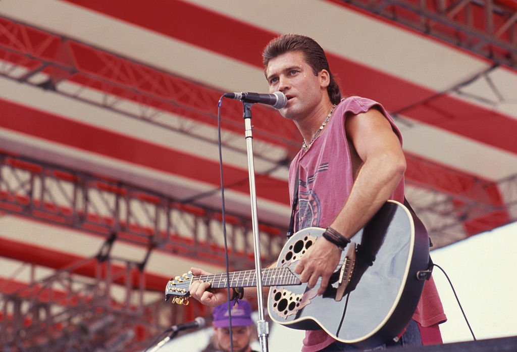 Image Credits: Getty Images / Laura Levine/Corbis | Billy Ray Cyrus performing at Fan Fair in Nashville