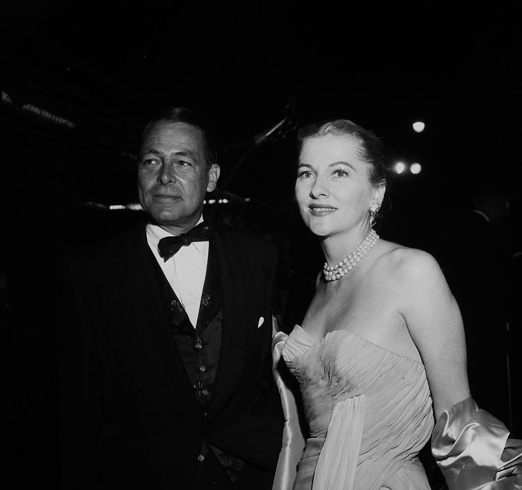 Image Source:Getty Images/Michael Ochs Archives/Earl Leaf/Joan Fontaine and husband Collier Young attend at party in 1957