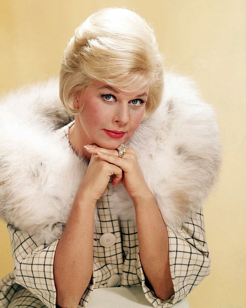 Image Credits: Getty Images / Silver Screen Collection | American actress Doris Day in a fur-trimmed coat, circa 1963.