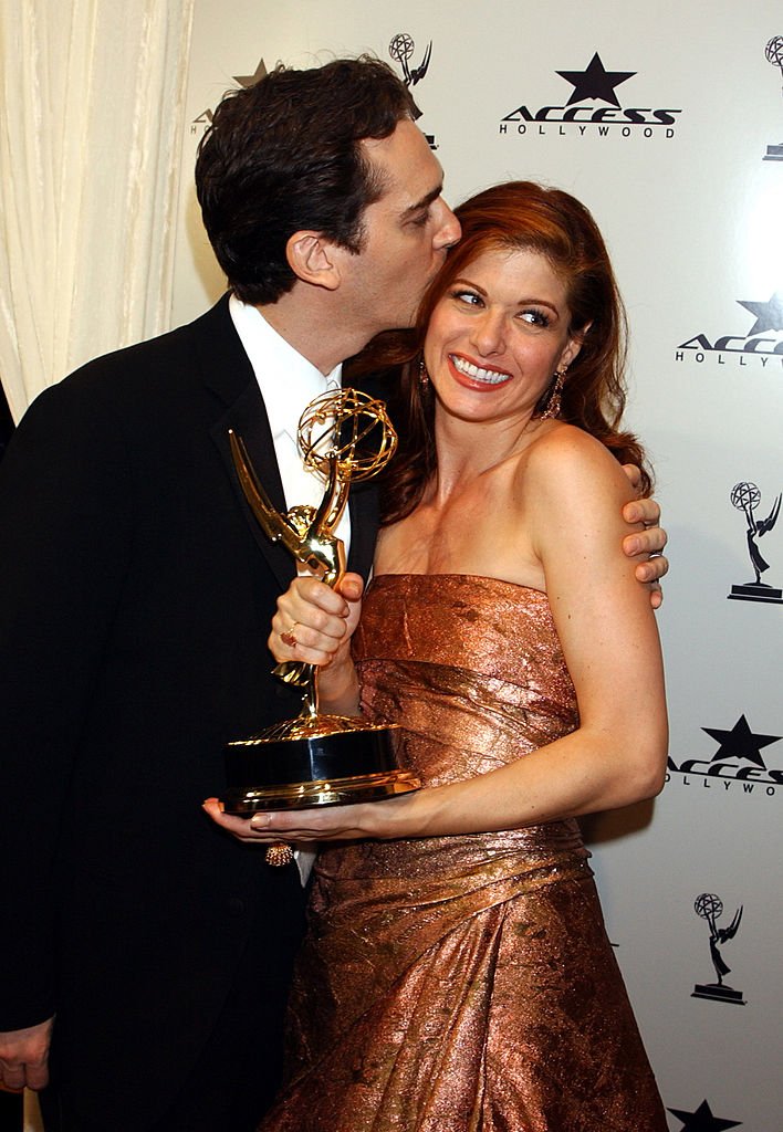 Image Source: Getty Images/George Pimentel| Debra Messing and husband Daniel Zelman with her Emmy for Outstanding Lead Actress in a Comedy Series for 'Will & Grace'