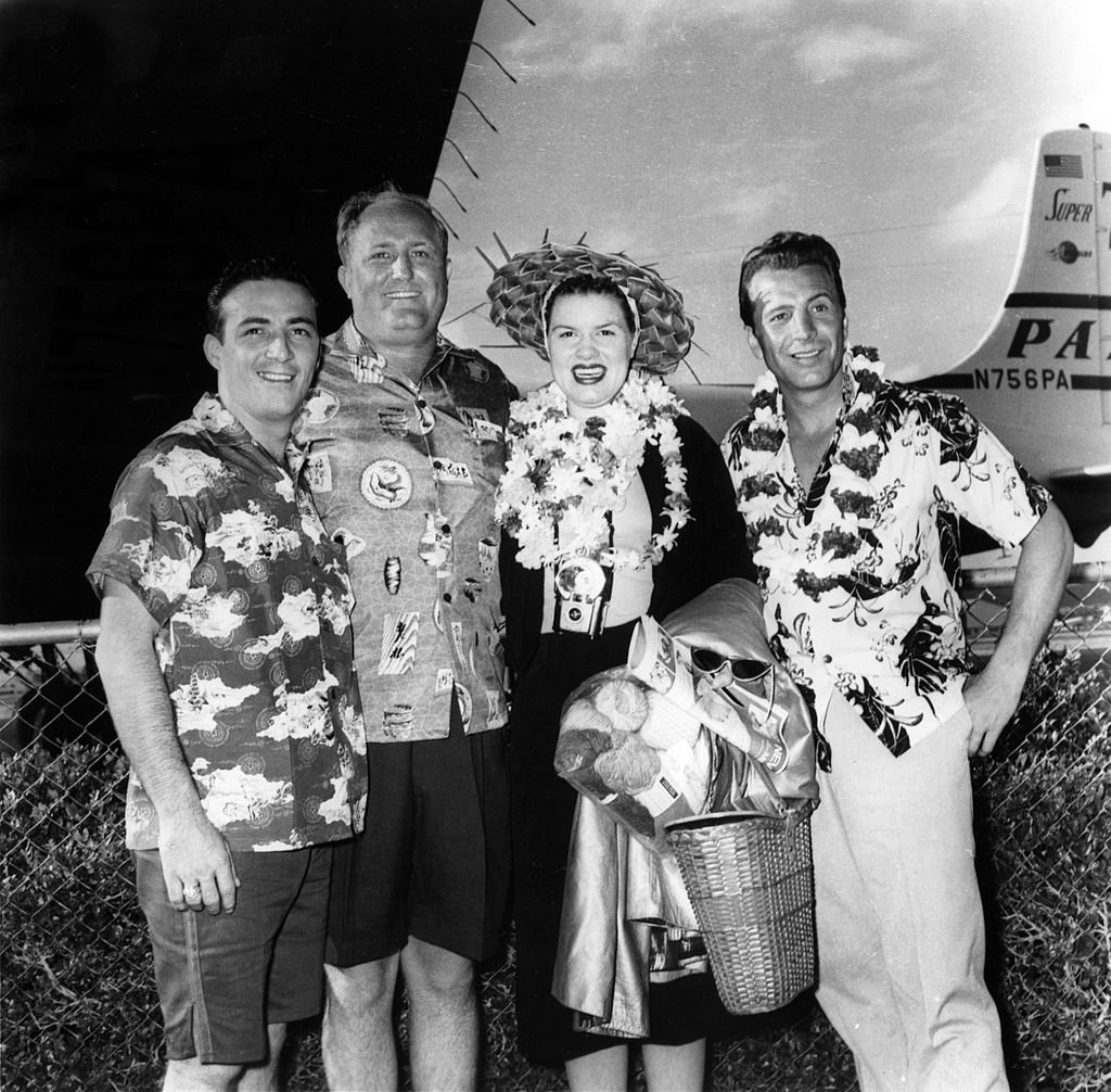 Image Credit: Getty Images / Country musicians Faron Young, Patsy Cline and Ferlin Husky pose for a portrait wearing tropical clothing in circa 1960.