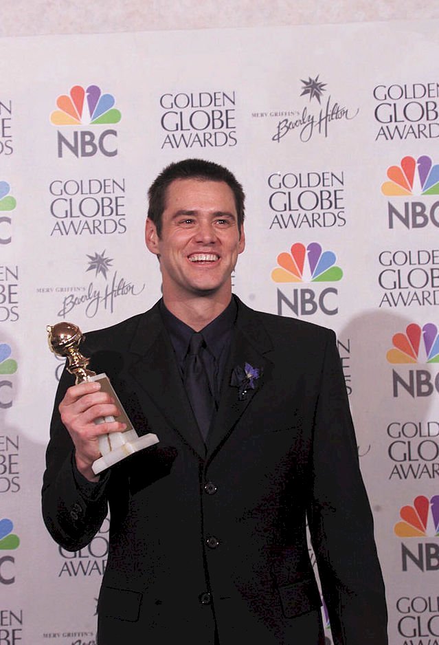 Image Credit: Getty Images / Jim Carrey wins a Golden Globe award in 1999. Image Credit: Getty Images / Jim Carrey wins a Golden Globe award in 1999.